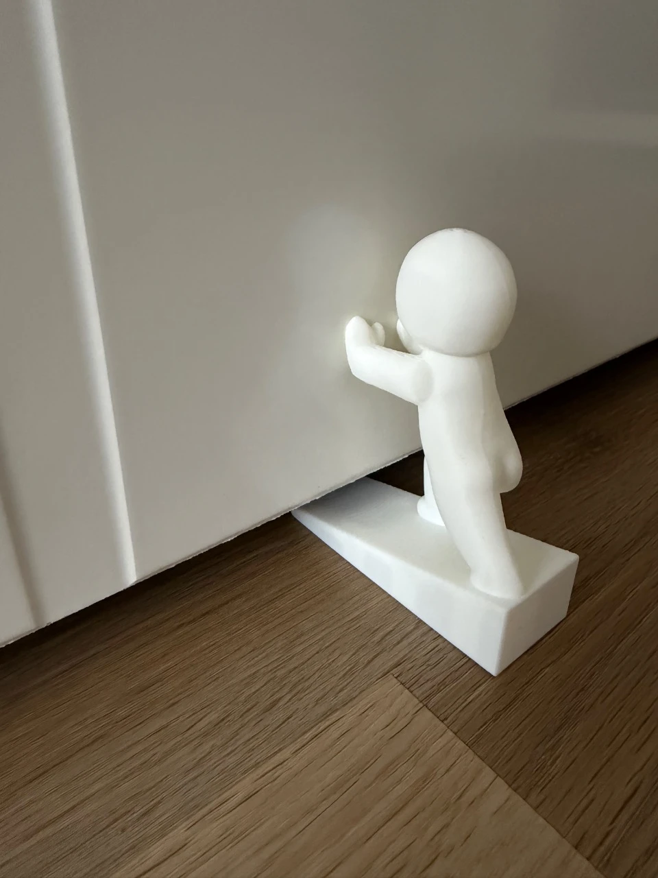 Cute little guy doorstop